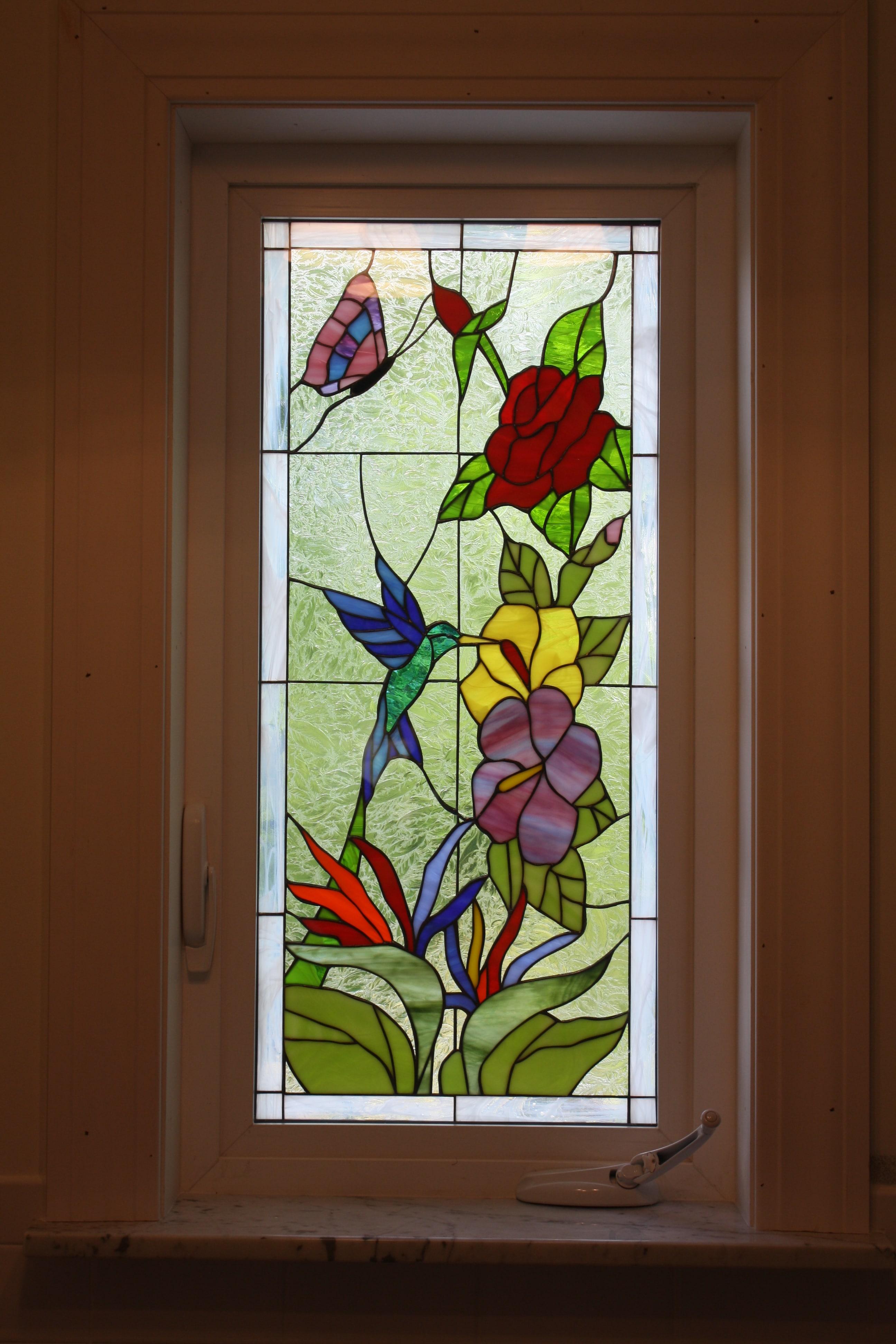 Triple paned Hummingbird & Flowers Stained Glass Window In A Crank Out