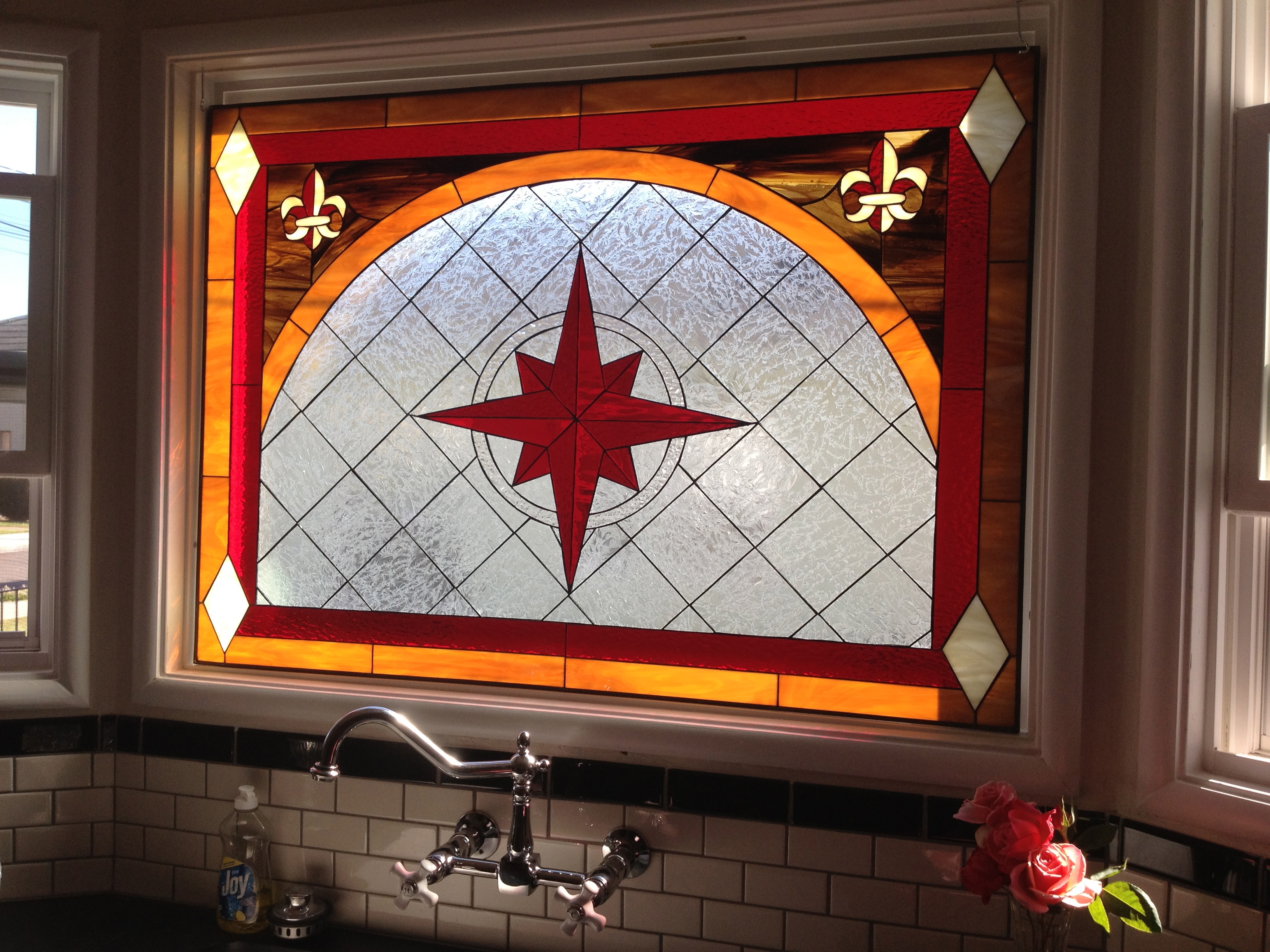 Stained Glass Window installed over Kitchen Sink