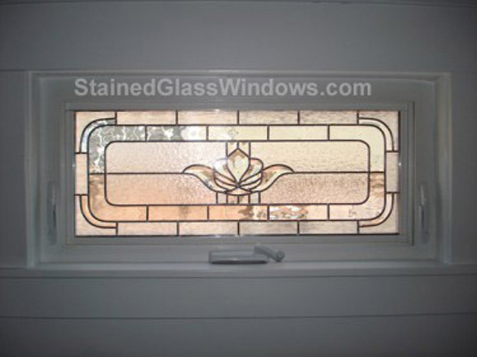 Classic beveled window installed in a vinyl crank out window