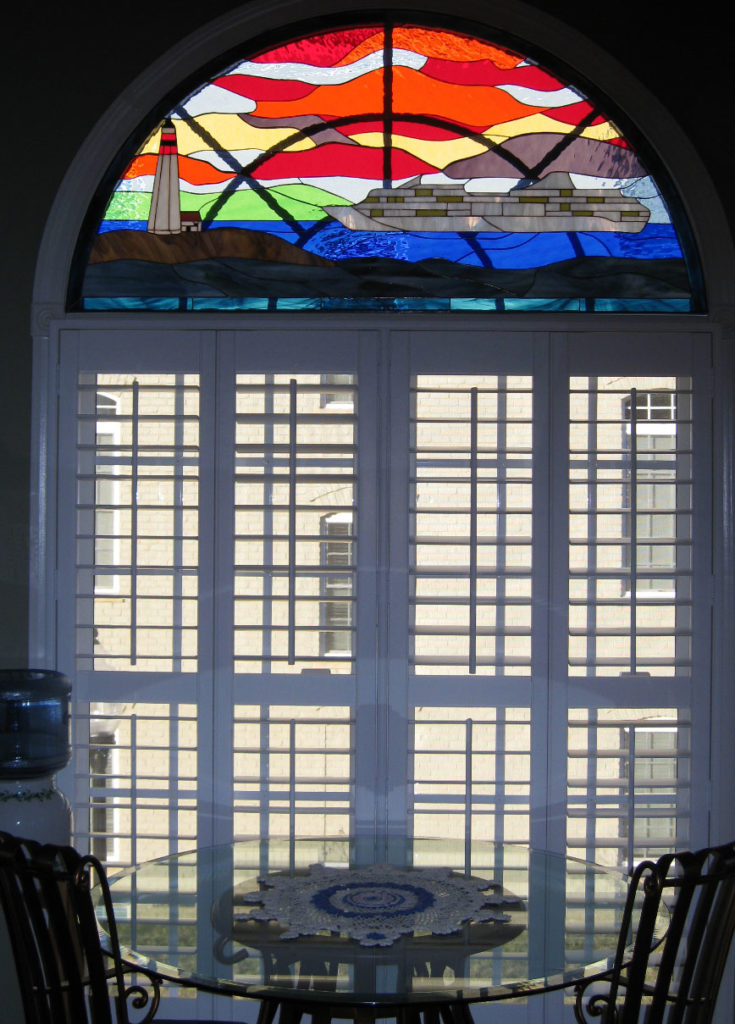stained glass window of cruise ship, lighthouse