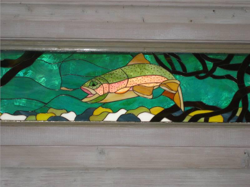 Rainbow trout stained glass window installed in kitchen