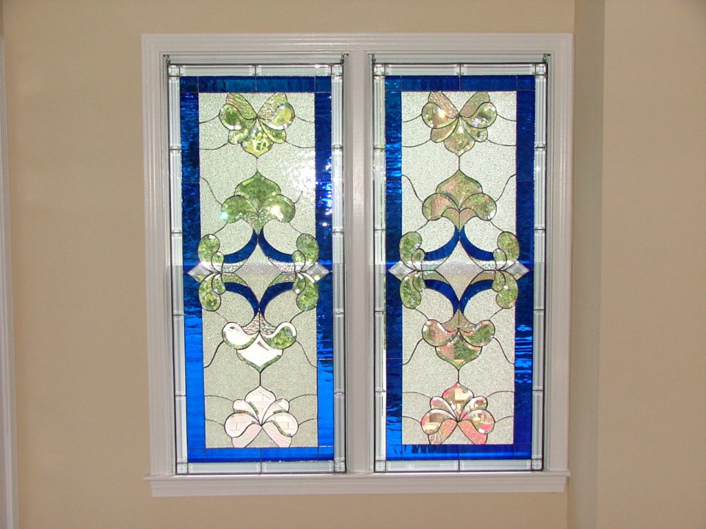 Pair Of Beveled Window Simply Hung With Hooks In Window