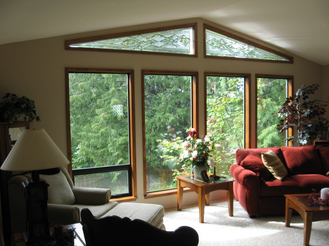 Pair of elegant beveled windows installed in living room