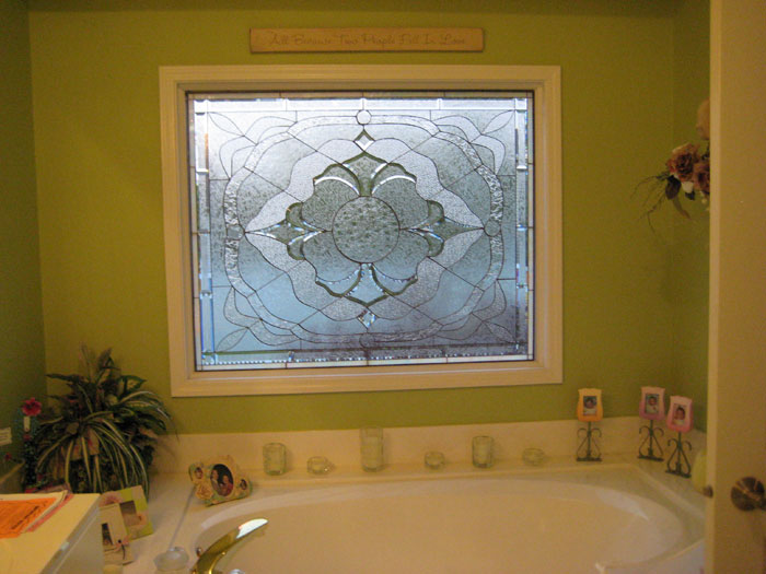 Magnificent clear beveled window installed into a bathroom over tub