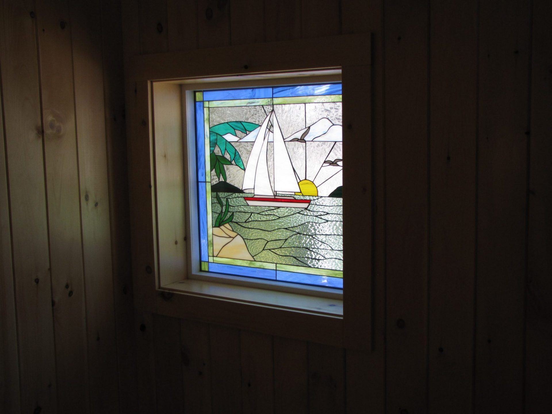 Sailboat In Paradise Stained Glass Windows Installed Into A Vinyl Frame