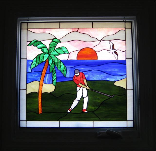 Stained Glass Golfer Hung Inside Window Frame With A Chain