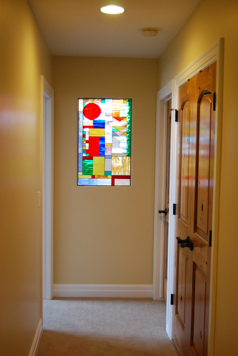 Mission Prairie Style Stained Glass Window Installed In A Hallway