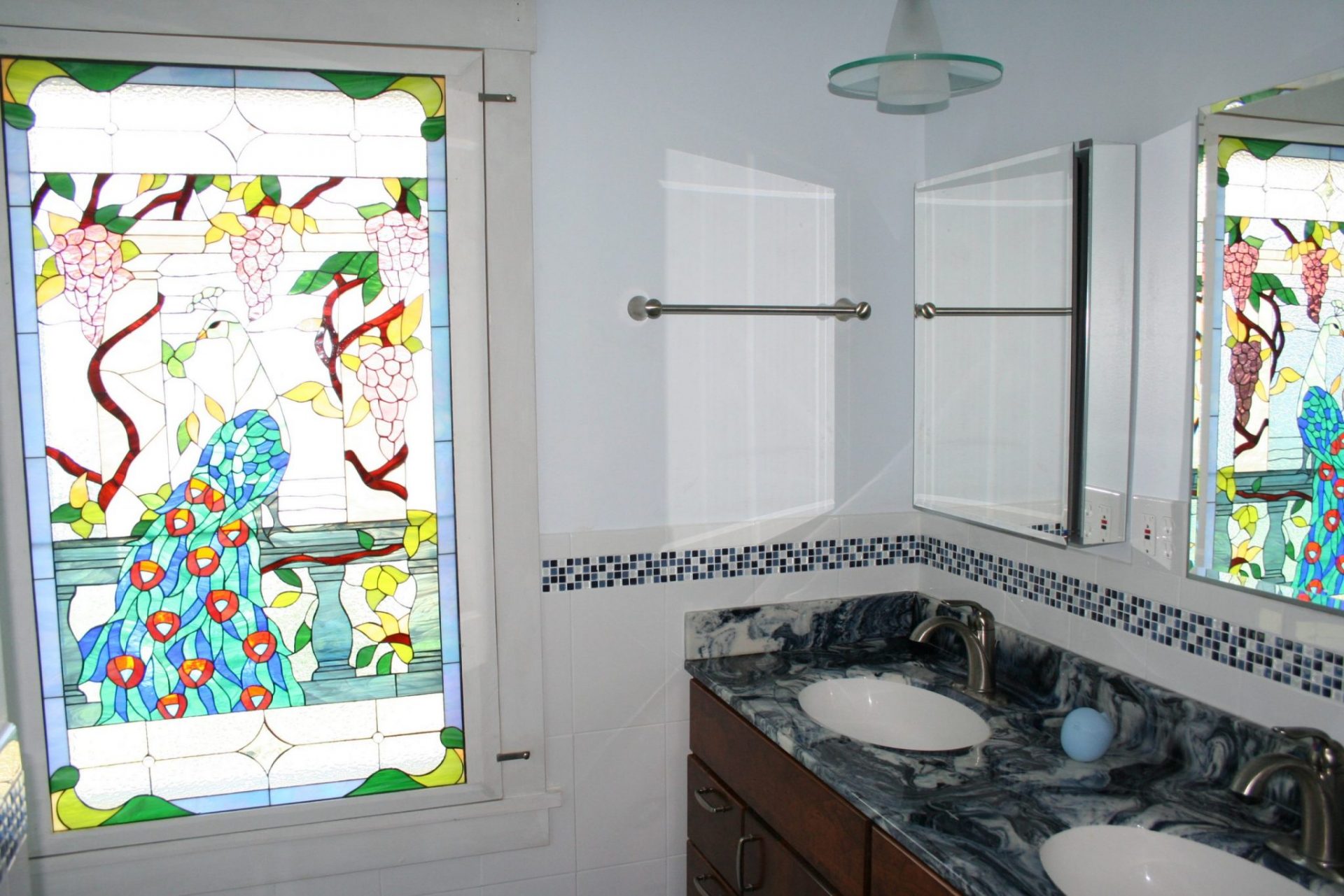 Colorful Peacock Stained Glass Window Installed Into A Bathroom