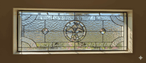 A rectangular clear leaded stained glass transom window panel featuring a central circular beveled Fleur-de-lis design, flanked by two smaller circular bevels, and set within various textured clear glass.