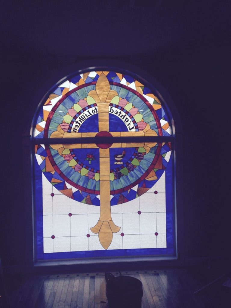 Huge Two-Piece Stained Glass Window Installed Into A Church