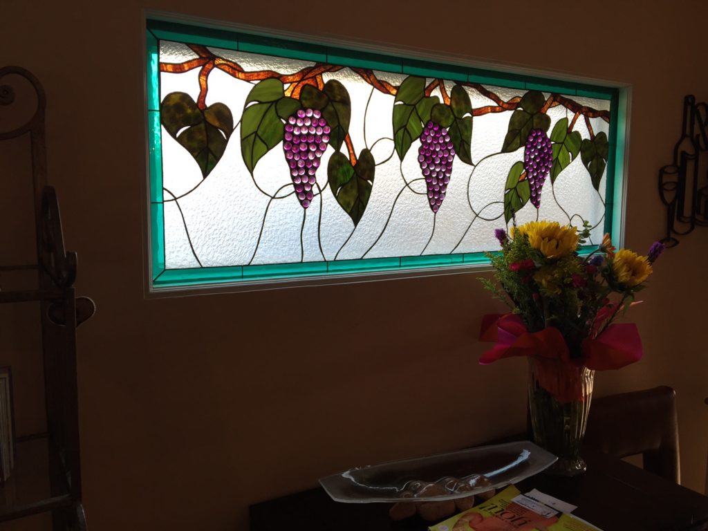 Beautiful GrapeVine Windows Installed Into a Kitchen For Decor And Privacy