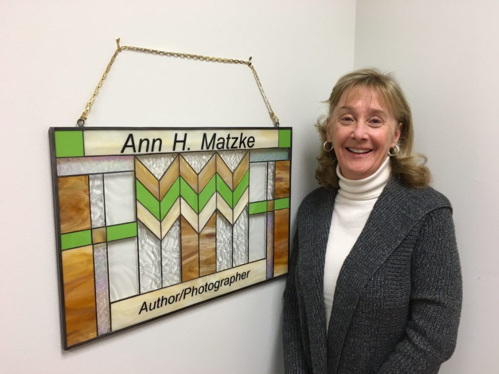 A stained Glass panel with lettering added to use as a sign