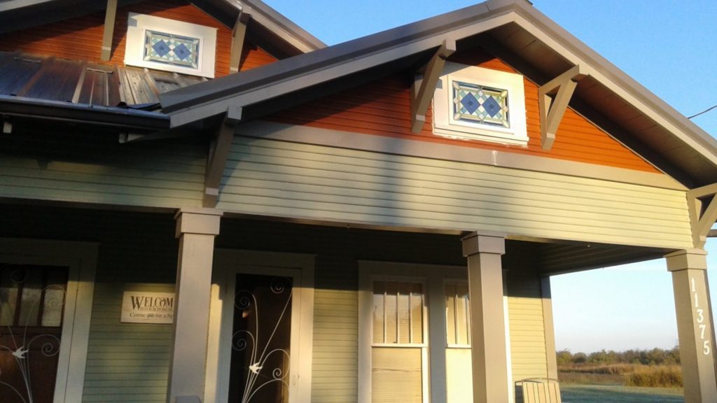 Two framed and insulated stained glass leaded windows installed in Grand Prairie, Michigan
