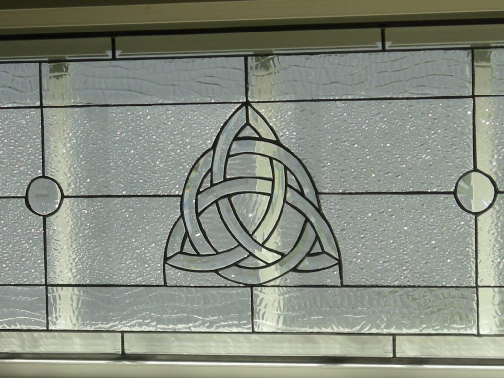 Stained Glass Celtic knot window insert held in with mirror clips!