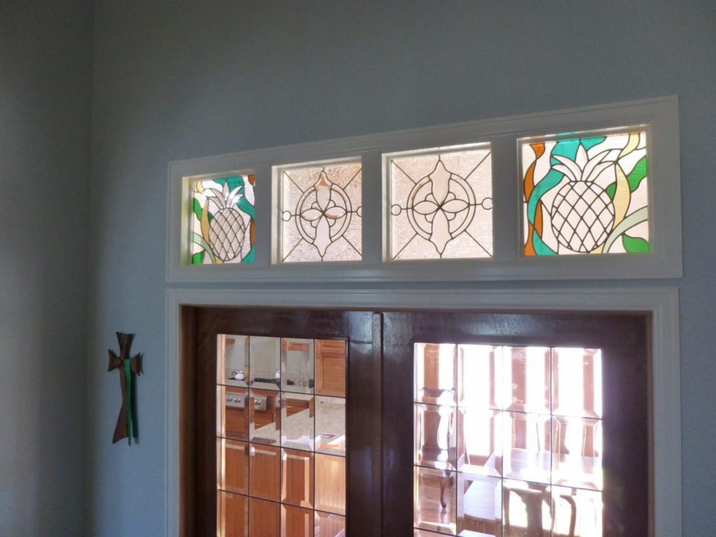 decorative pineapple & beveled transom stained glass windows