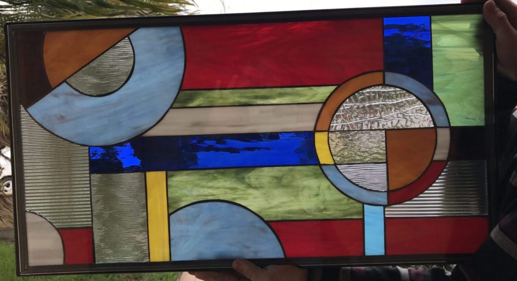 The "Merlin" Colorful Geometric Stained Glass Window Panel