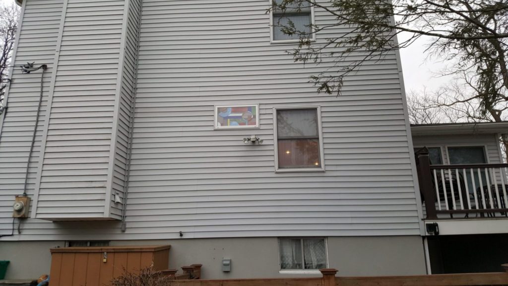 Air Conditioning Units Removed And Replaced With Vinyl Framed Stained Glass Windows