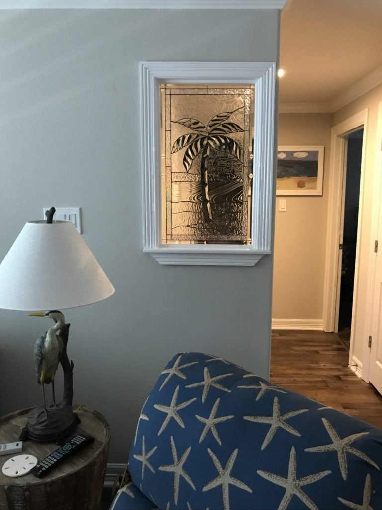 Triple Paned Beveled Palm Tree Used Within A Partition