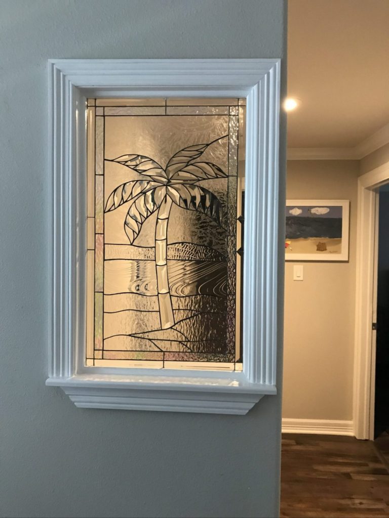 Lovely Triple Paned Beveled Palm Tree Used Within A Partition