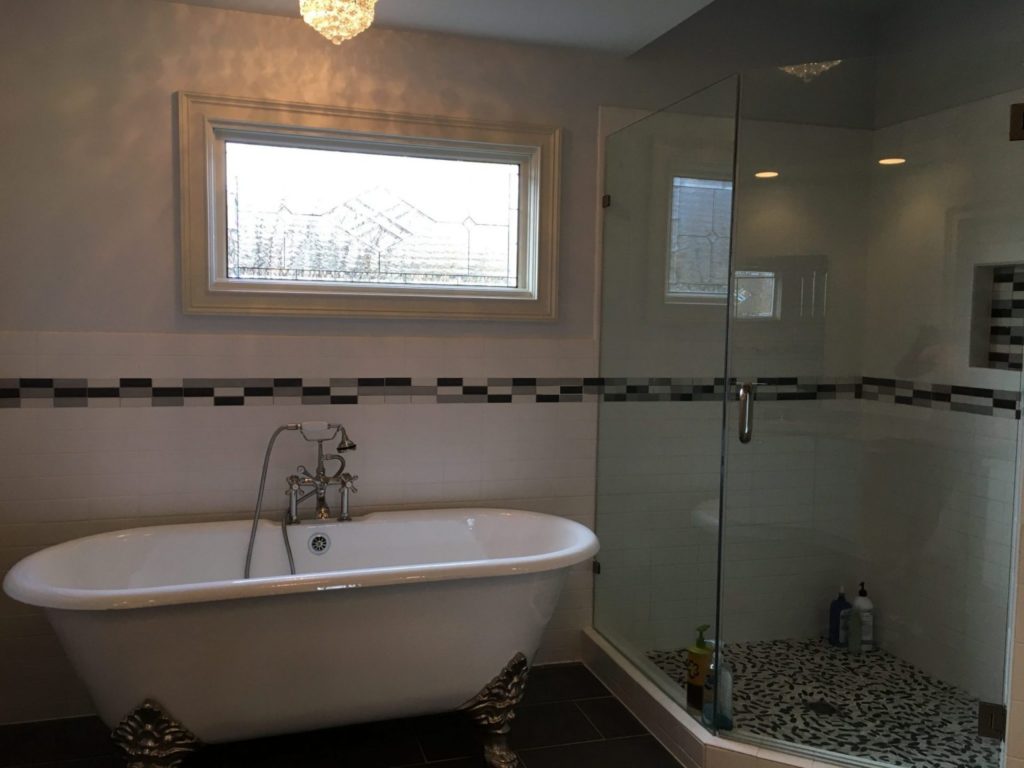 Stained & Beveled Glass Insulated Window Installed Above A Bathtub