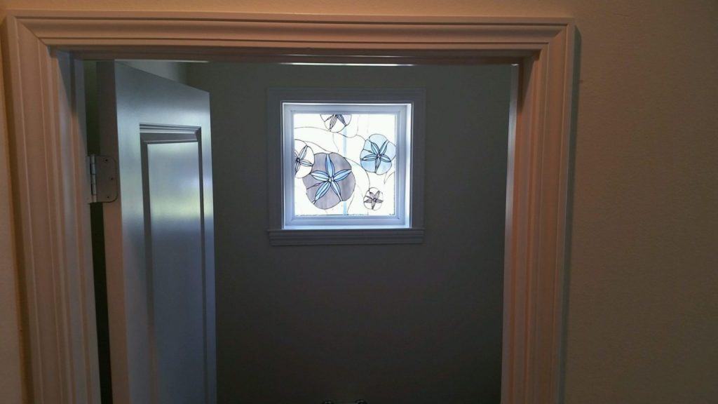 Sand Dollar Window Inserts Installed In A Beach House On The East Coast