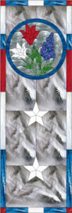 A rectangular leaded stained glass panel with a patriotic theme. The top features a circular medallion with a red tulip, white lily, and blue grape hyacinth flowers on a clear textured background, bordered in blue. The lower section showcases two white five-pointed stars against similar clear textured glass. The panel is framed by red, white, and blue accent strips along the top, bottom, and sides.