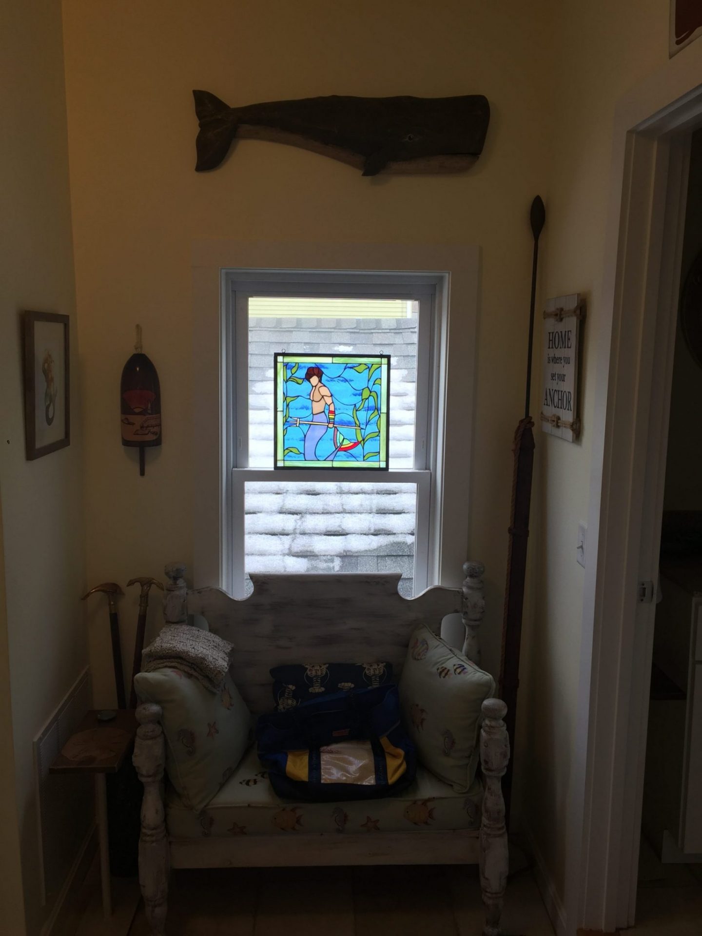 Merman Stained Glass Panel Suspended in a Window