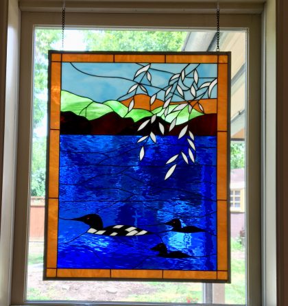 "Loons On The Paddle" Stained Glass Window Hung In A Kitchen Area