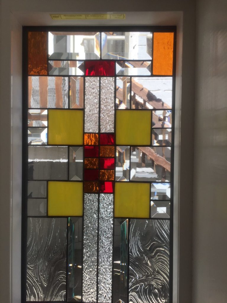 A set of beautiful craftsman style windows which provide  privacy, beauty and natural light