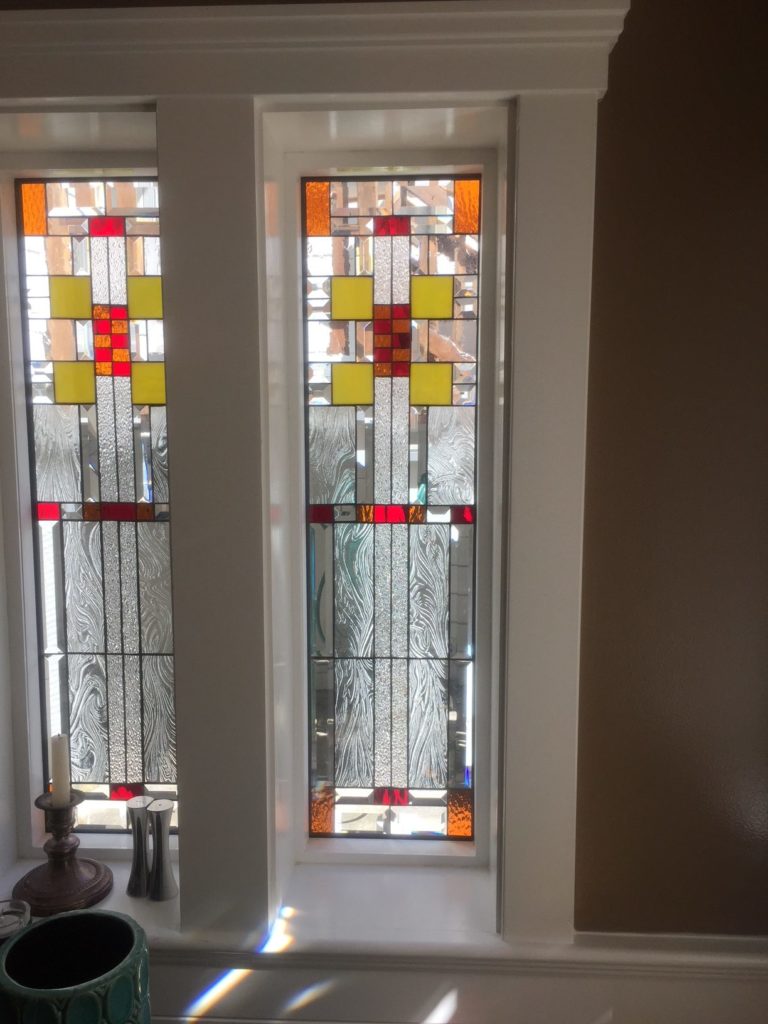 beautiful craftsman style windows which provide  privacy, beauty and natural light