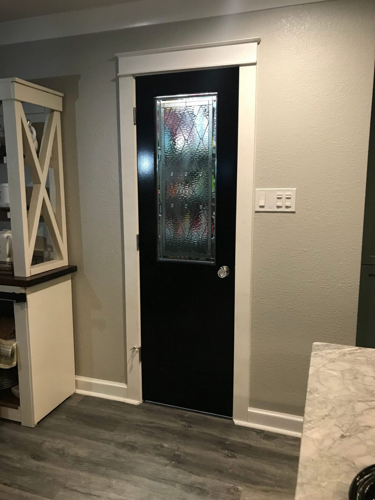 Diamonds and jewels insert installed into a pantry door