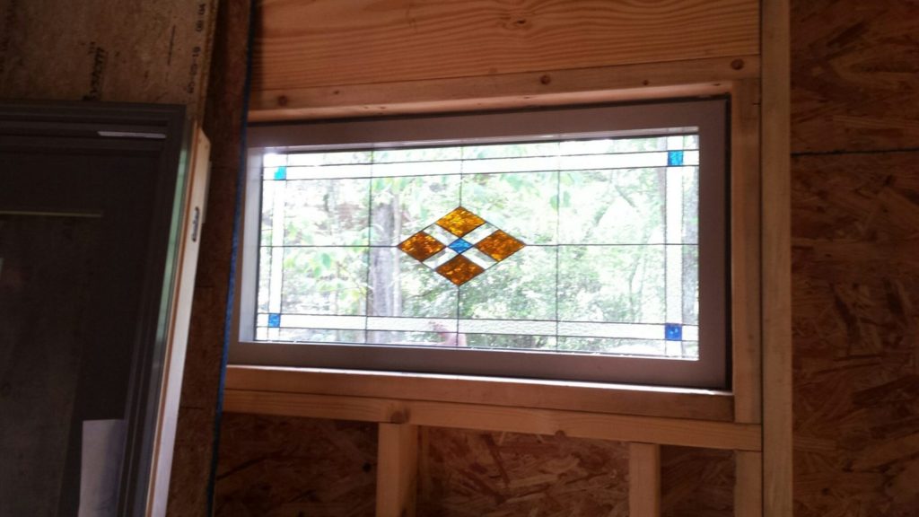 A variety of stained glass windows installed during the construction process
