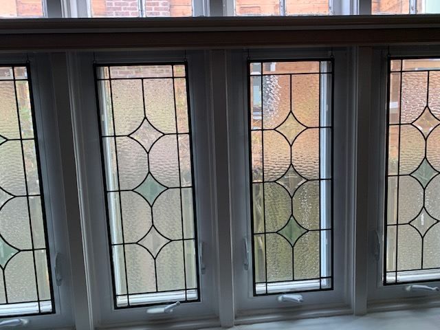 Classic Leaded Glass Windows Installed In A Living Room For Curb Appeal, Privacy And Beauty