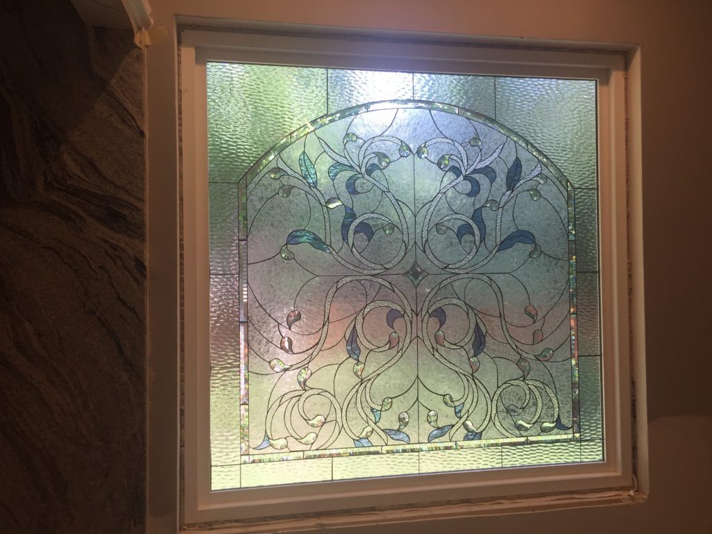Huge beveled floral stained glass windows