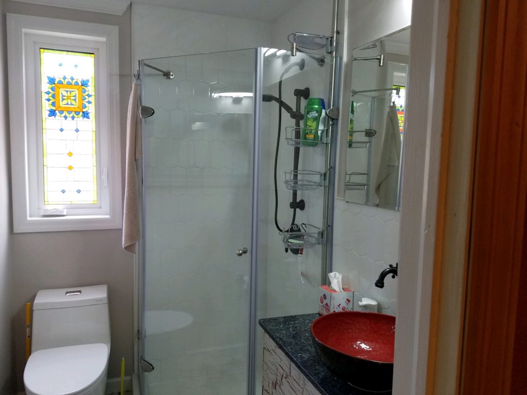 Stained Glass Talavera Window Installed In A Bathroom For Privacy and Beauty