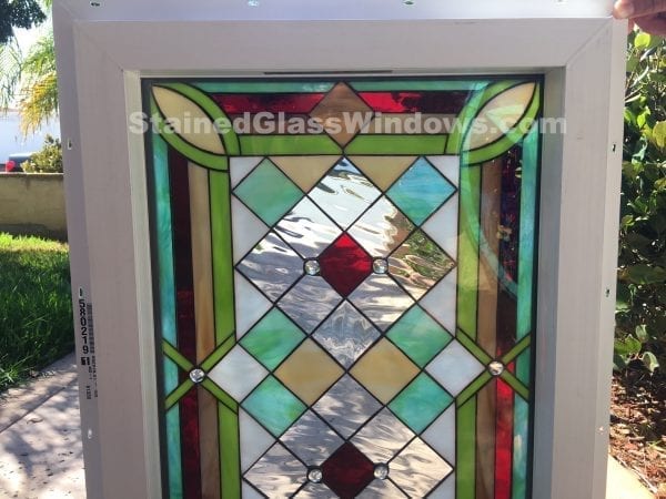 The “Malibu” Leaded Stained Glass Window Panel Insulated And Pre-installed Into Frame Vinyl Frame