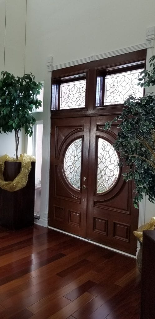 Victorian style brass came beveled windows made for a clients entryway