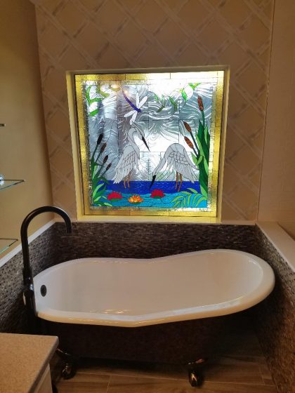 Exquisite Egret/Heron & Water Lily Stained Glass Window Installed Over A Claw Tub In A Bathroom
