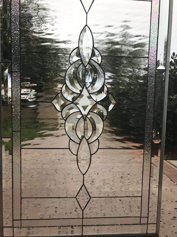 The "Oakley" Classic Beveled Clear Glass Cluster with Leaded Waterglass Background