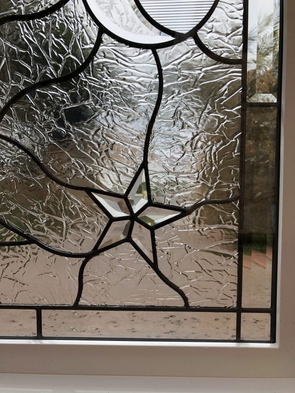 The " Mystical, Sun, Moon And Star" Beveled Leaded Stained Glass Window