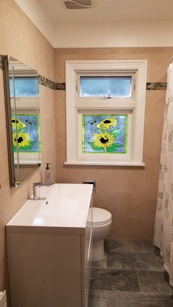 So lovely! Stained Glass Sunflower & Bee Stained Glass Window Installed In A Bathroom
