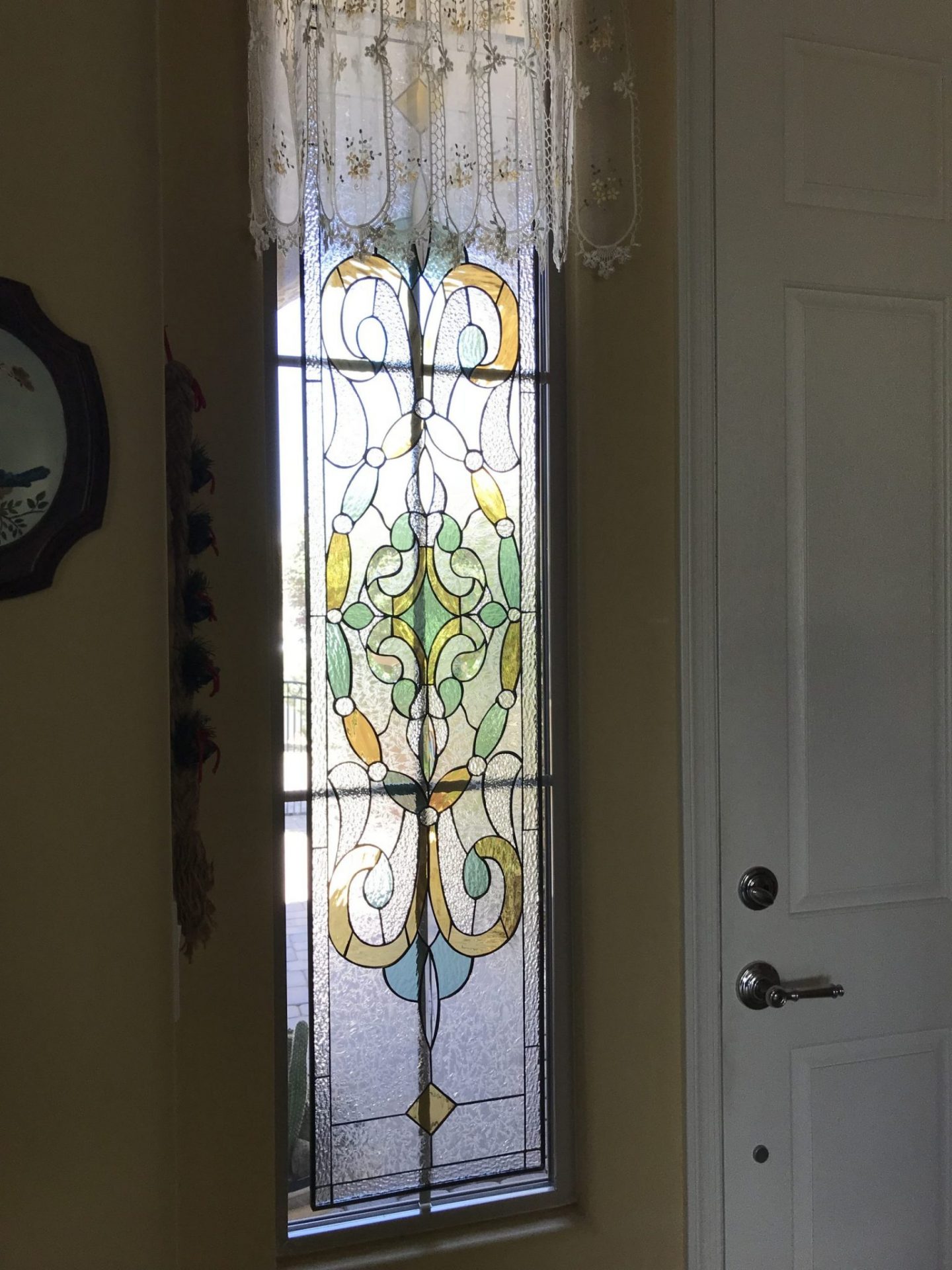 Victorian Stained Glass Window Set Against Existing Window With Grid System And Still Looks Great!