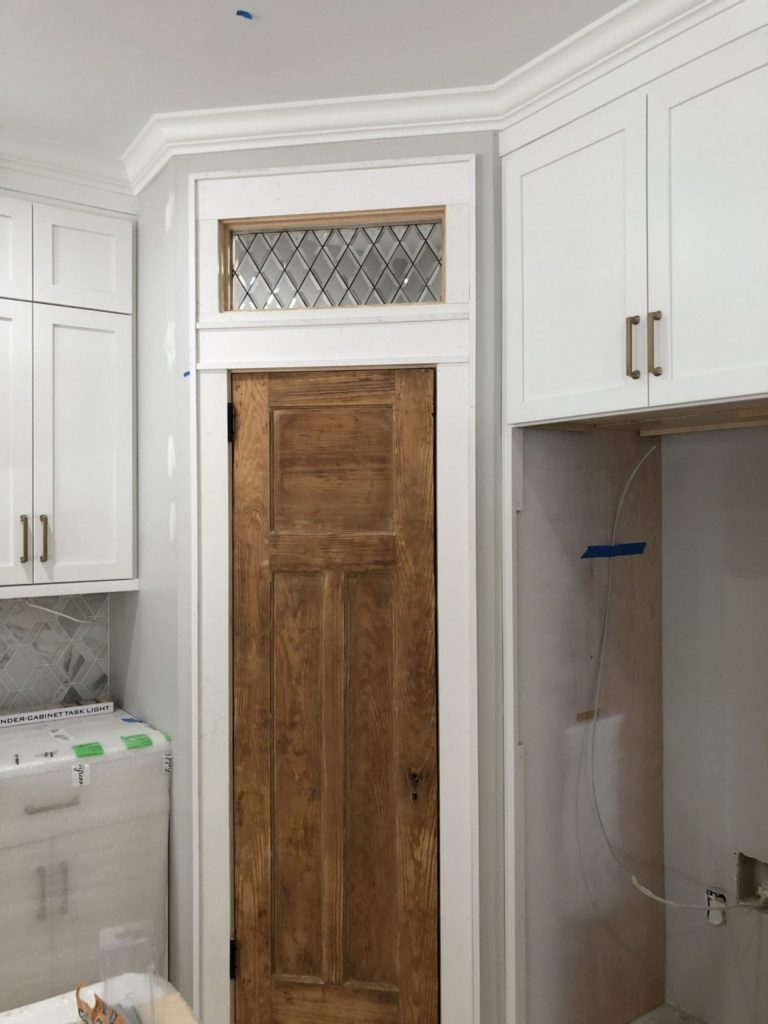 Classic Beveled Diamonds Used As A Transom Window