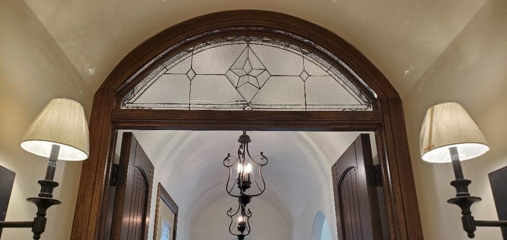 A Lovely Arched Stained Glass Transom Window Installed In Texas