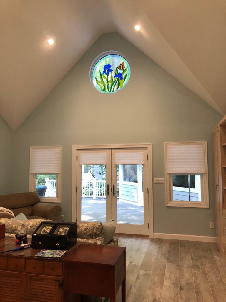 42" Round Iris & Butterfly Window Installed In A Client's Living Room, Also Provides Massive Curb Appeal!