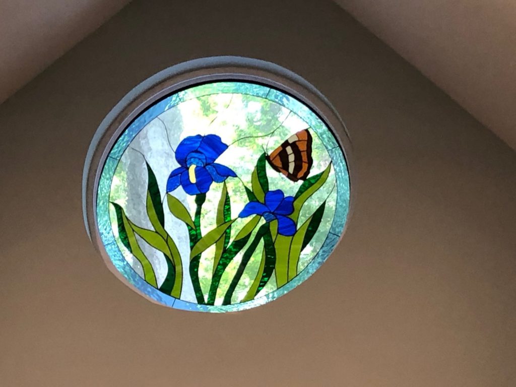 42" Round Iris & Butterfly Window Installed In A Client's Living Room, Also Provides Massive Curb Appeal!