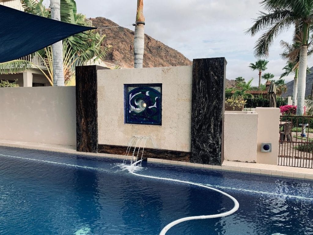 Unique! A Pool Side Water Feature Filled In With A Cresting Wave Stained Glass Panel