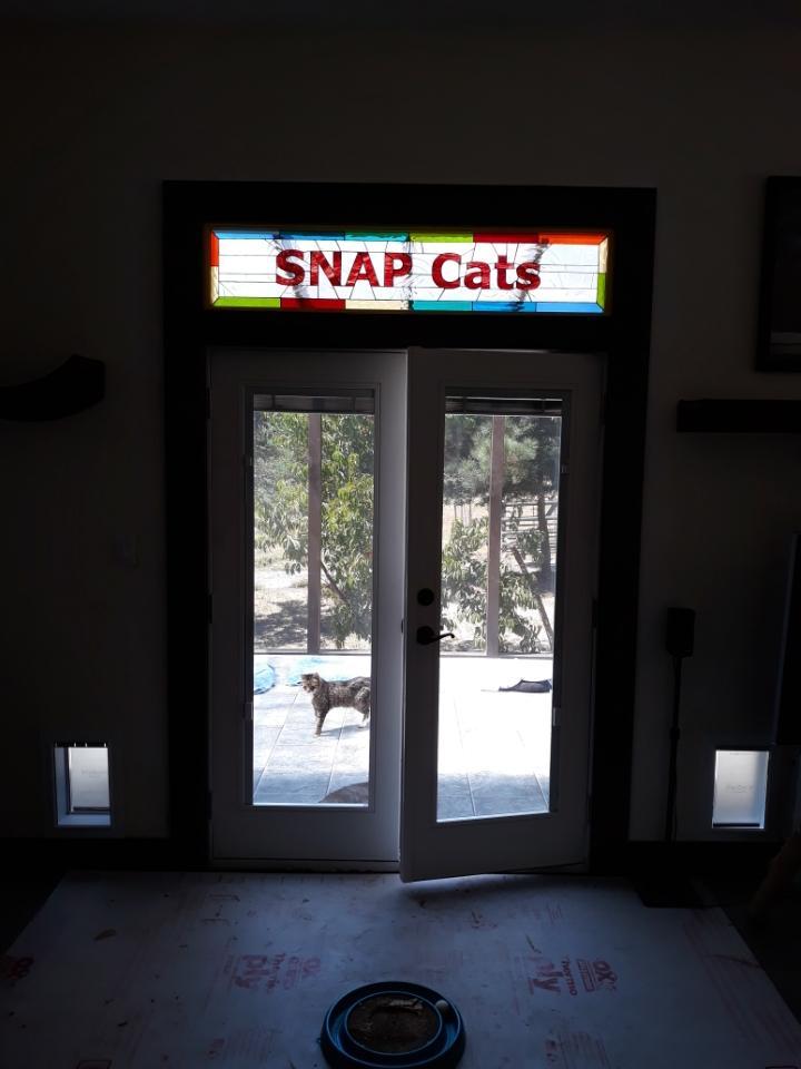 Snapcats.org Logo Stained Glass Transom in a Rescue House