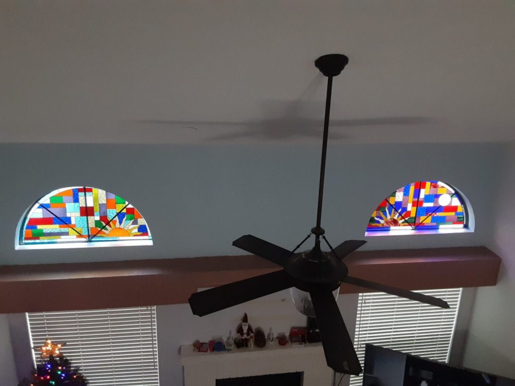 Stained Glass Window Inserts above Fireplace Windows
