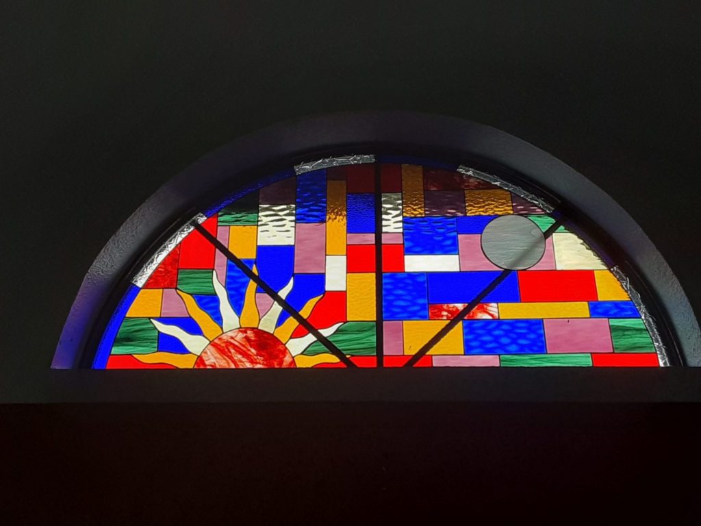 Arched colorful sun setting Stained Glass